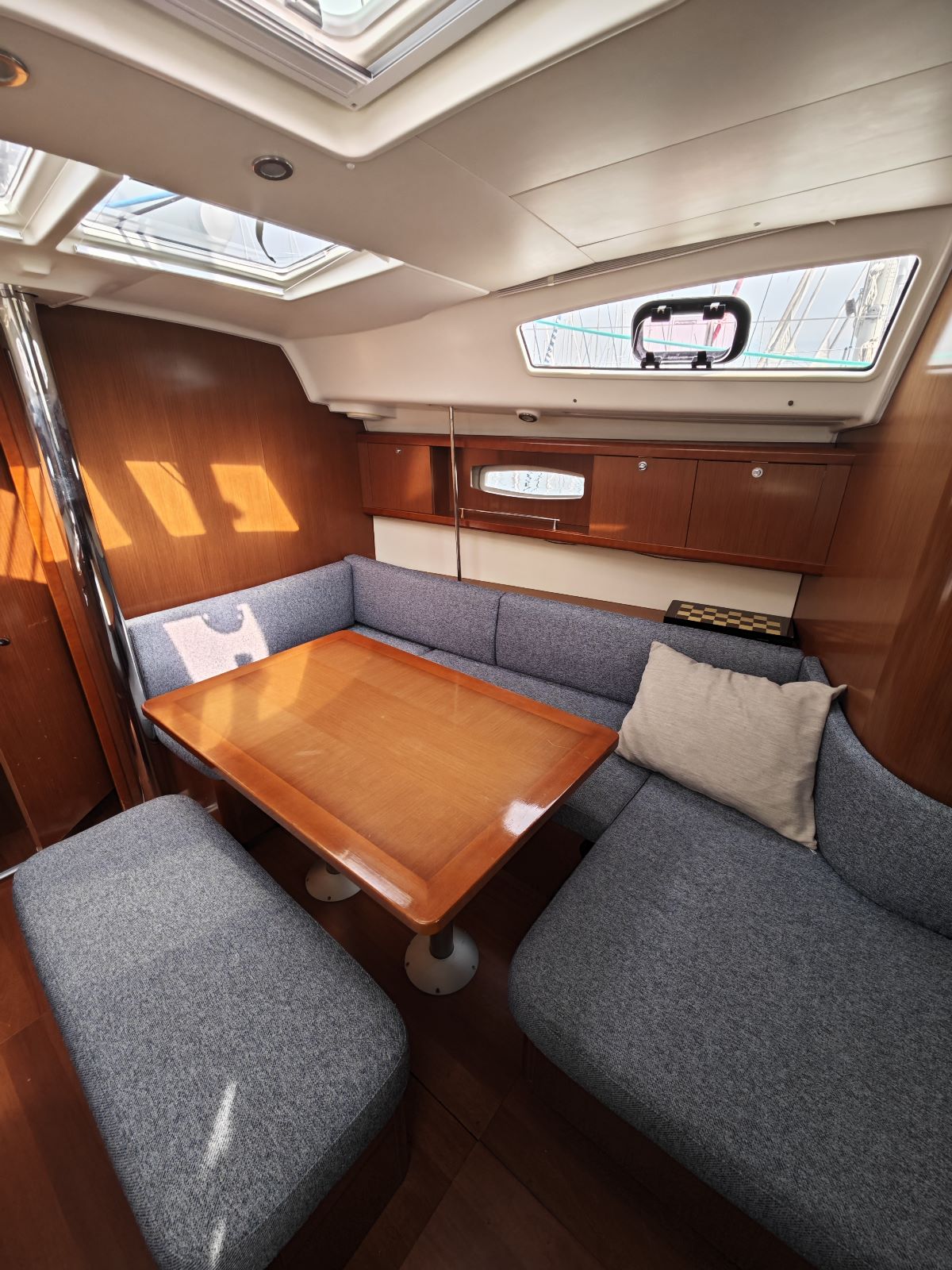 Saloon table in sailing yacht Beneteau Oceanis 40 Violet in Fethiye in Turkey
